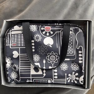 New without tag Lesportsac black/white make up bag